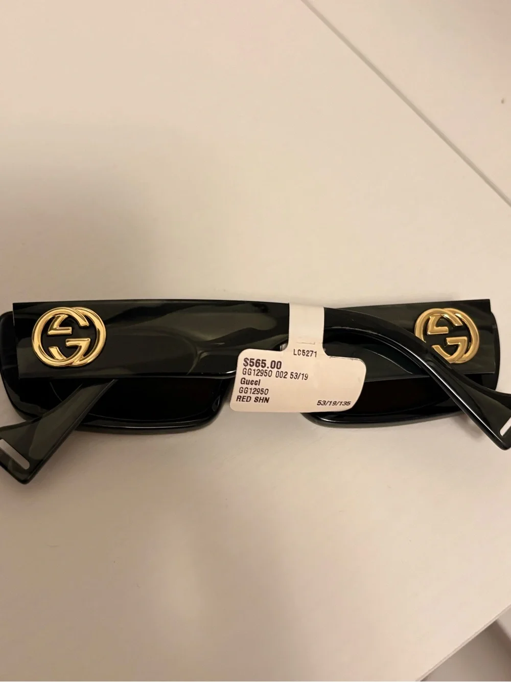 Gucci Black Sunglasses with Gold Accent Logo